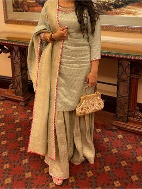 Ethnic Indian Wear Pale Green Palazzo Set with Gold Embroidery and Pink Trim